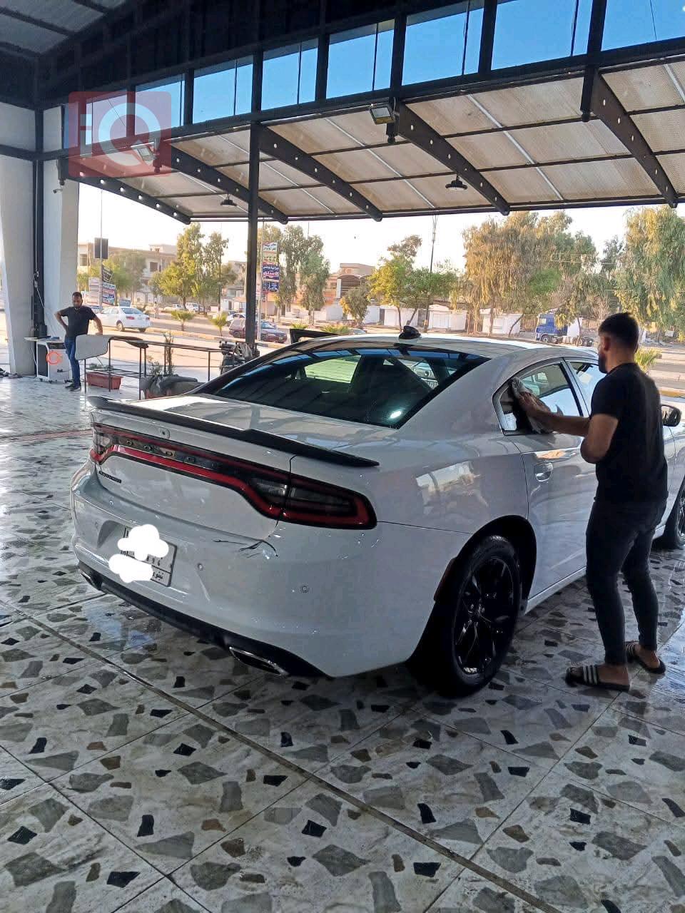 دۆج چارجەر